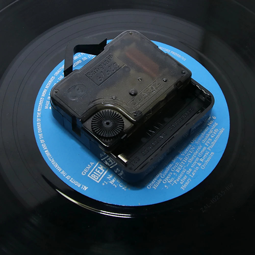 Collection of LED vinyl record clocks and quartz clock
