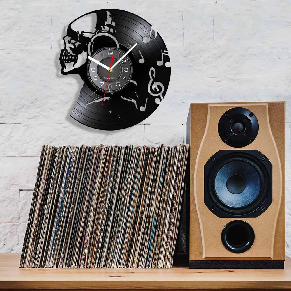 Music Never Dies Skull Vinyl Record Wall Clock showing precision-cut design - unique retro clock for man cave and music room - staged next to speaker