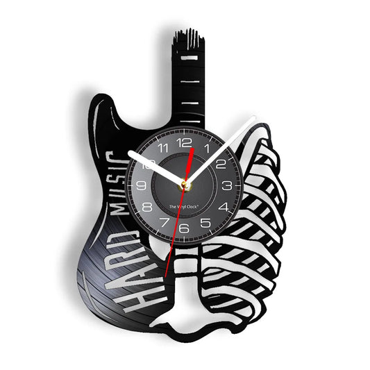 Guitar vinyl record wall clock featuring intricate laser-cut electric guitar design with detailed strings, frets, and body on black vinyl record