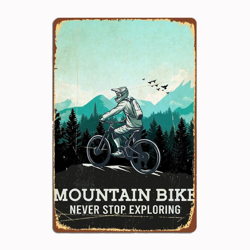 Mountain Bike Never Stop Exploring vintage metal tin sign featuring dramatic mountain biker silhouette against vibrant turquoise mountain landscape with classic distressed edges and retro weathered finish