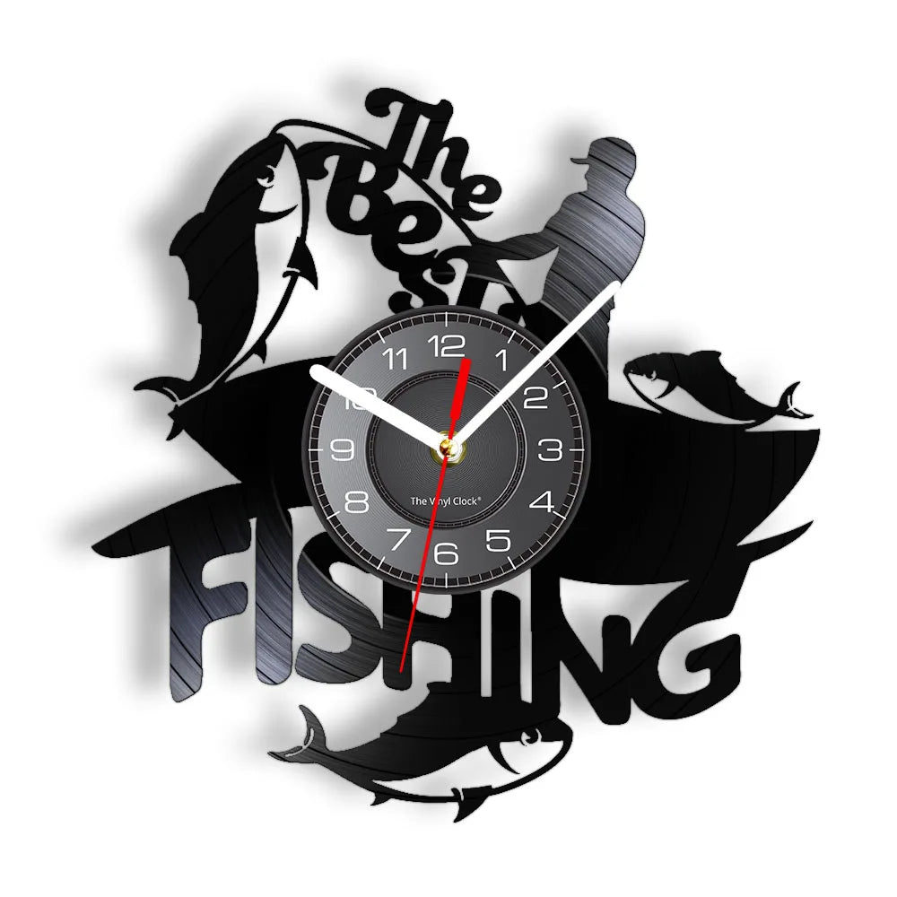 I'd Rather Be Fishing vinyl record wall clock featuring intricate laser-cut design with fisherman casting line with arcing rod, jumping fish, water splashes, and bold I'd Rather Be FISHING text on black vinyl record