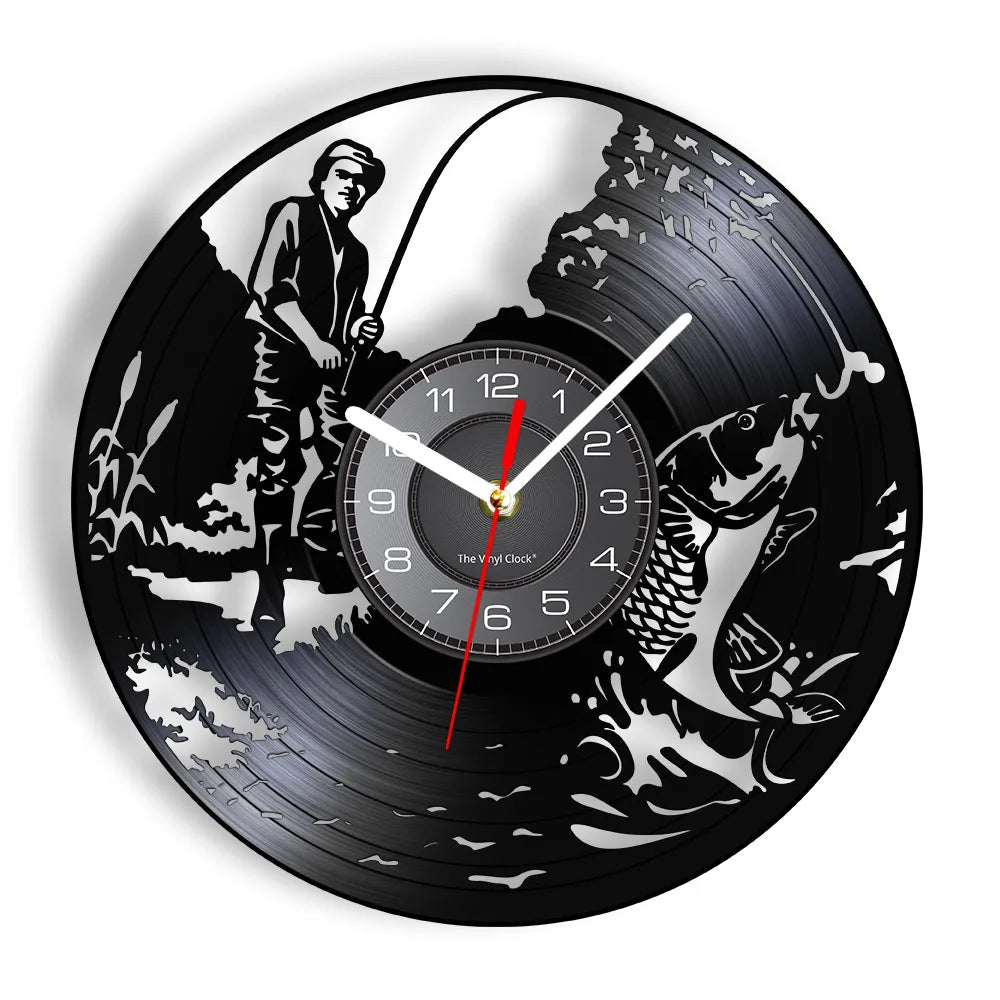 Fishing vinyl record wall clock featuring intricate laser-cut design with fisherman reeling in large fish with dramatically bent rod, fish jumping powerfully out of water creating splashes, cattails and water plants on black vinyl record