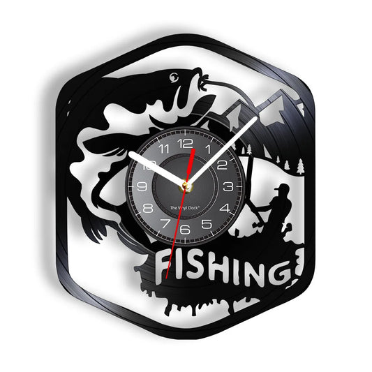 Fishing vinyl record wall clock featuring intricate laser-cut design with multiple fish silhouettes swimming around clock face and bold FISHING text on black vinyl record