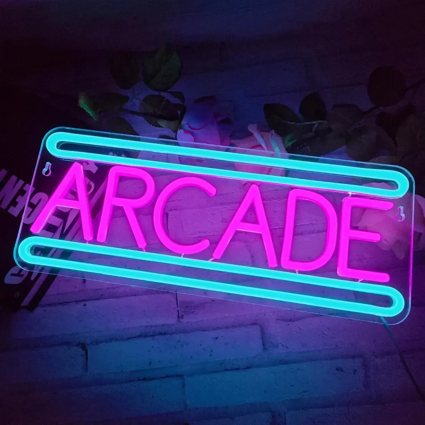ARCADE neon sign close-up showing blue and pink dual-color design with classic arcade styling" alternate view showing vibrant pink and blue glow in ambient setting
