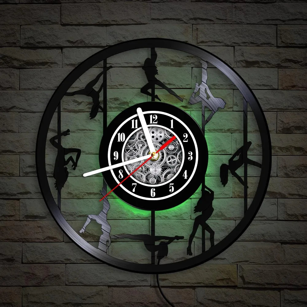 Pole Dance vinyl record wall clock with green LED backlighting close-up