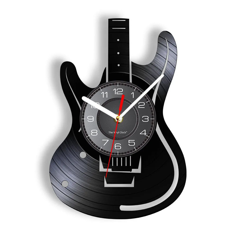 Electric guitar vinyl record wall clock featuring intricate laser-cut design with detailed strings, pickups, frets, and body on black vinyl record