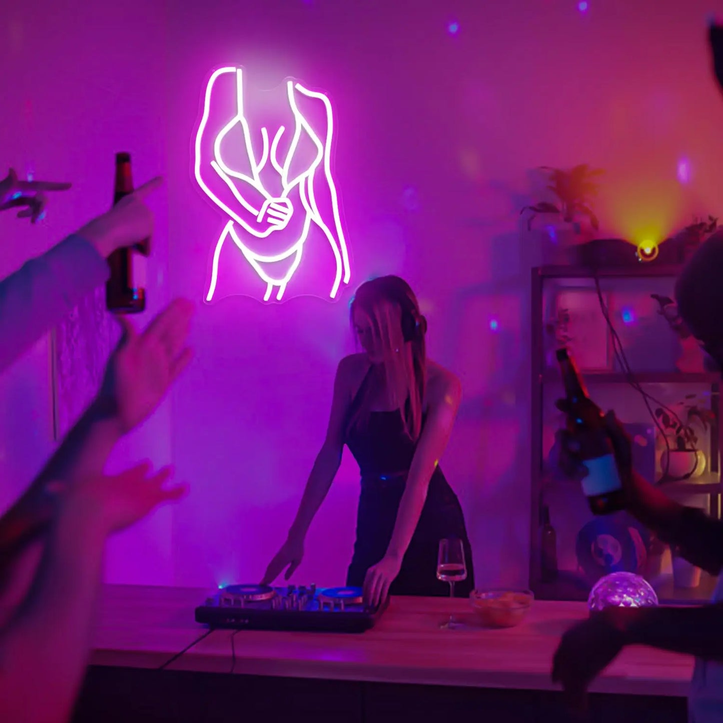 Curvy woman figure neon sign lifestyle shot showing vibrant pink glow in dark ambient bedroom setting