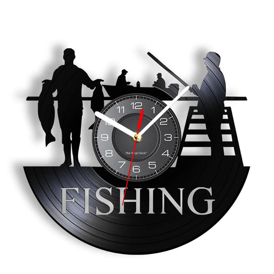 Fishing vinyl record wall clock featuring intricate laser-cut design with fishermen in boat on water, scenic landscape with trees, and bold FISHING text on black vinyl record