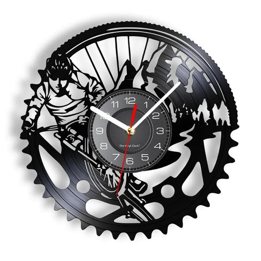 Mountain bike vinyl record wall clock featuring intricate laser-cut MTB design with detailed cyclist silhouette and bike components on black vinyl record