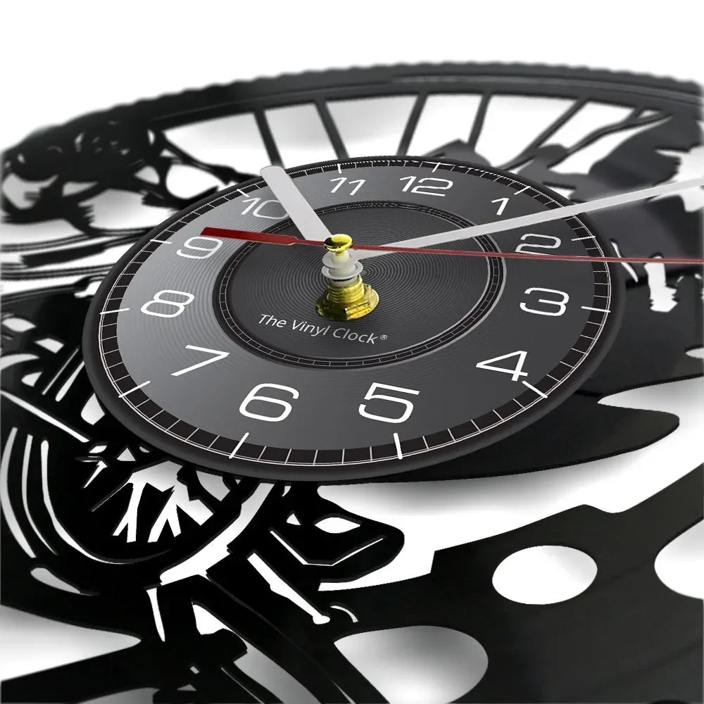 Mountain bike vinyl record clock close-up showing detailed gear and bike component cutout design