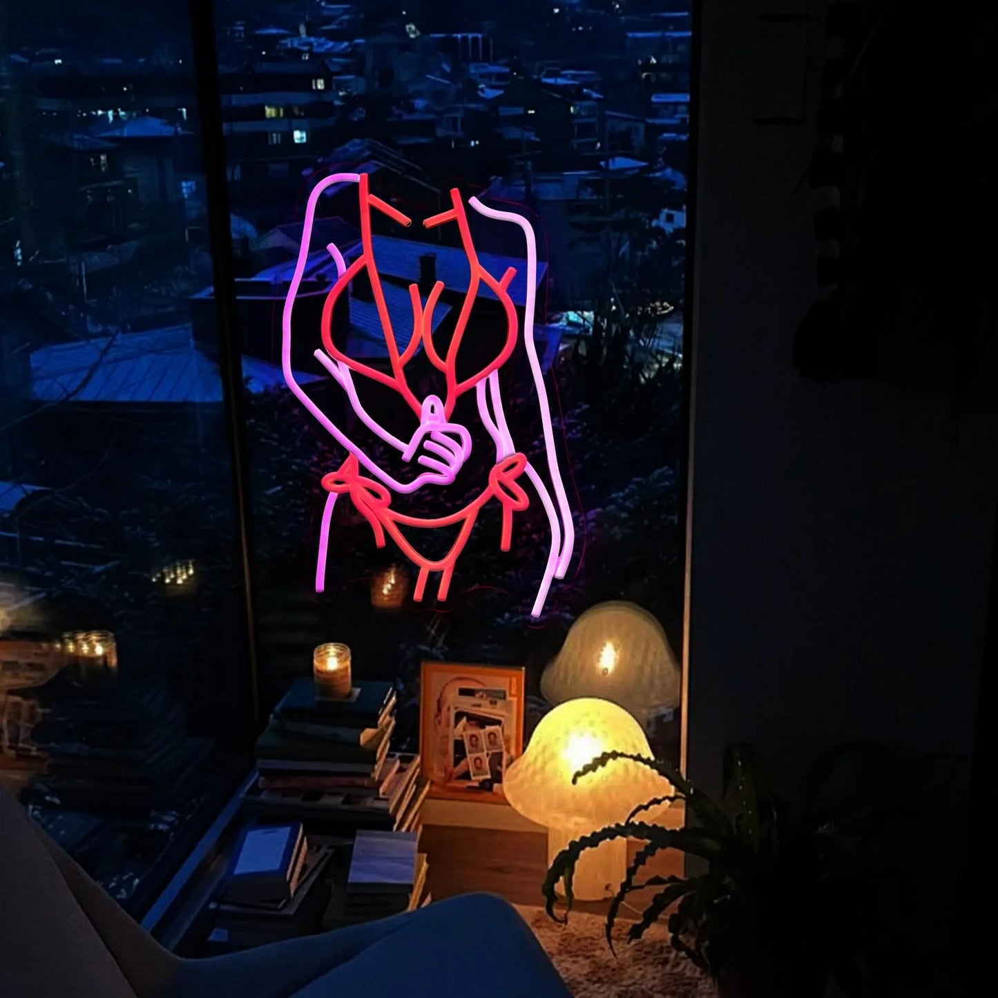 Rose neon sign lifestyle shot showing wall installation with vibrant pink glow in dark ambient setting