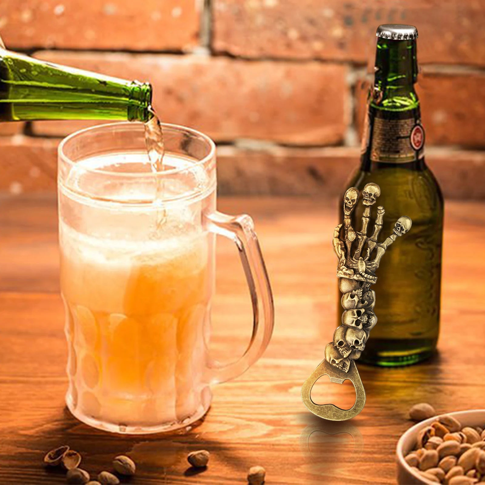 Skull Chain Bottle Opener Keychain in brass metal with linked skull design - unique EDC accessory - beer being poured