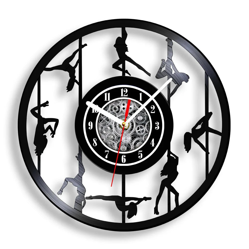 Pole Dance vinyl record wall clock featuring intricate laser-cut design with multiple dancer silhouettes performing various graceful poses around central pole on black vinyl record